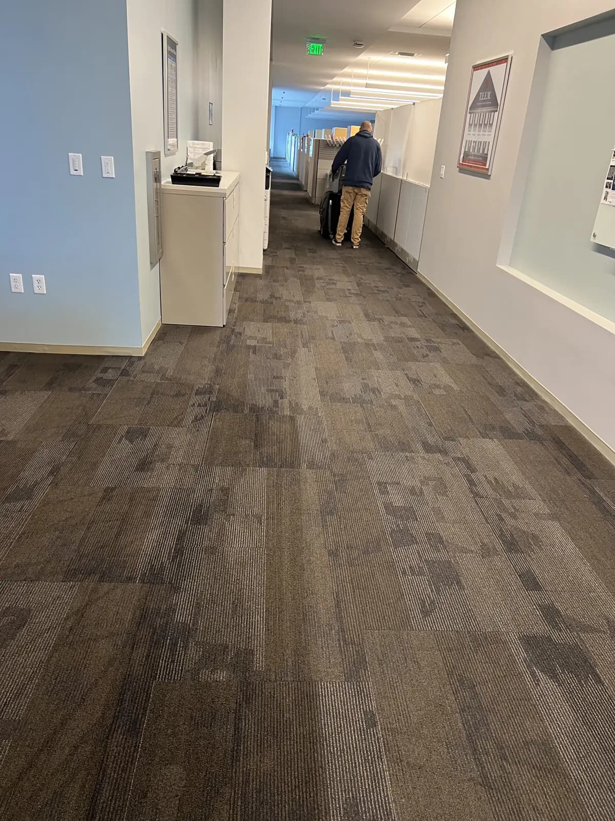 Office hallway carpet during cleaning